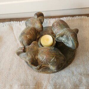 Terracotta triple elephant candle holder. Holds tealight or small pillar candle.